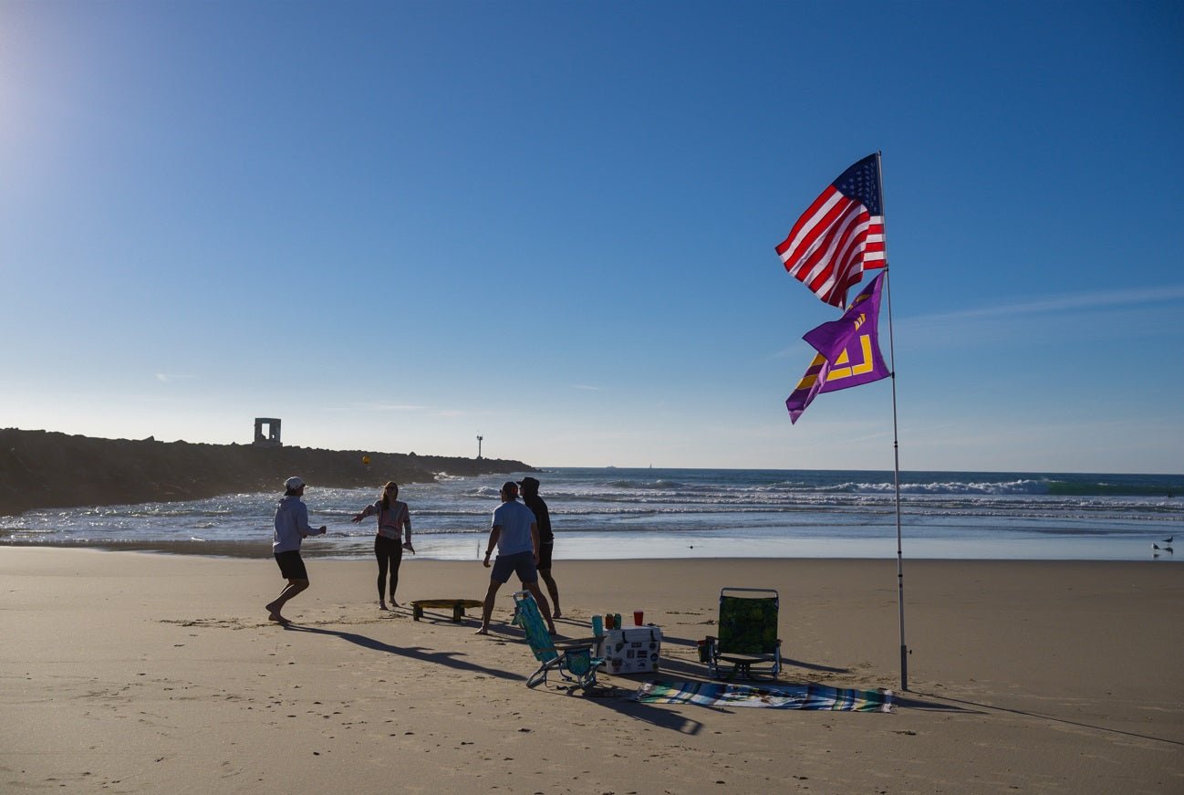 8 Reasons Why You Need a Beach Flagpole - Flagpole To-Go