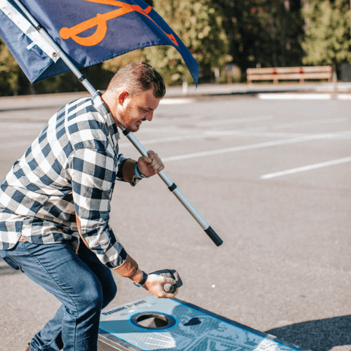hand held flag pole at tailgate