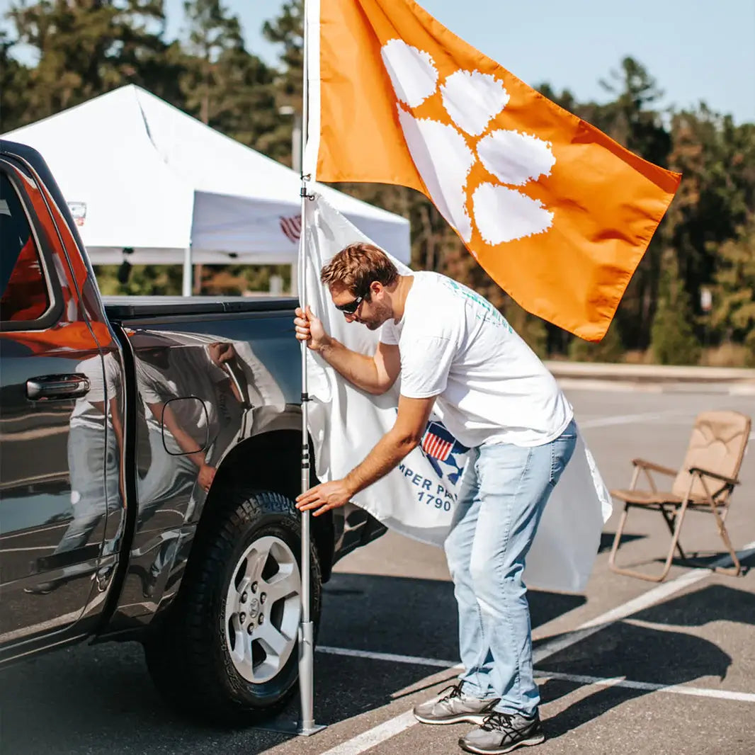 tailgate flag pole flying a clemson flag